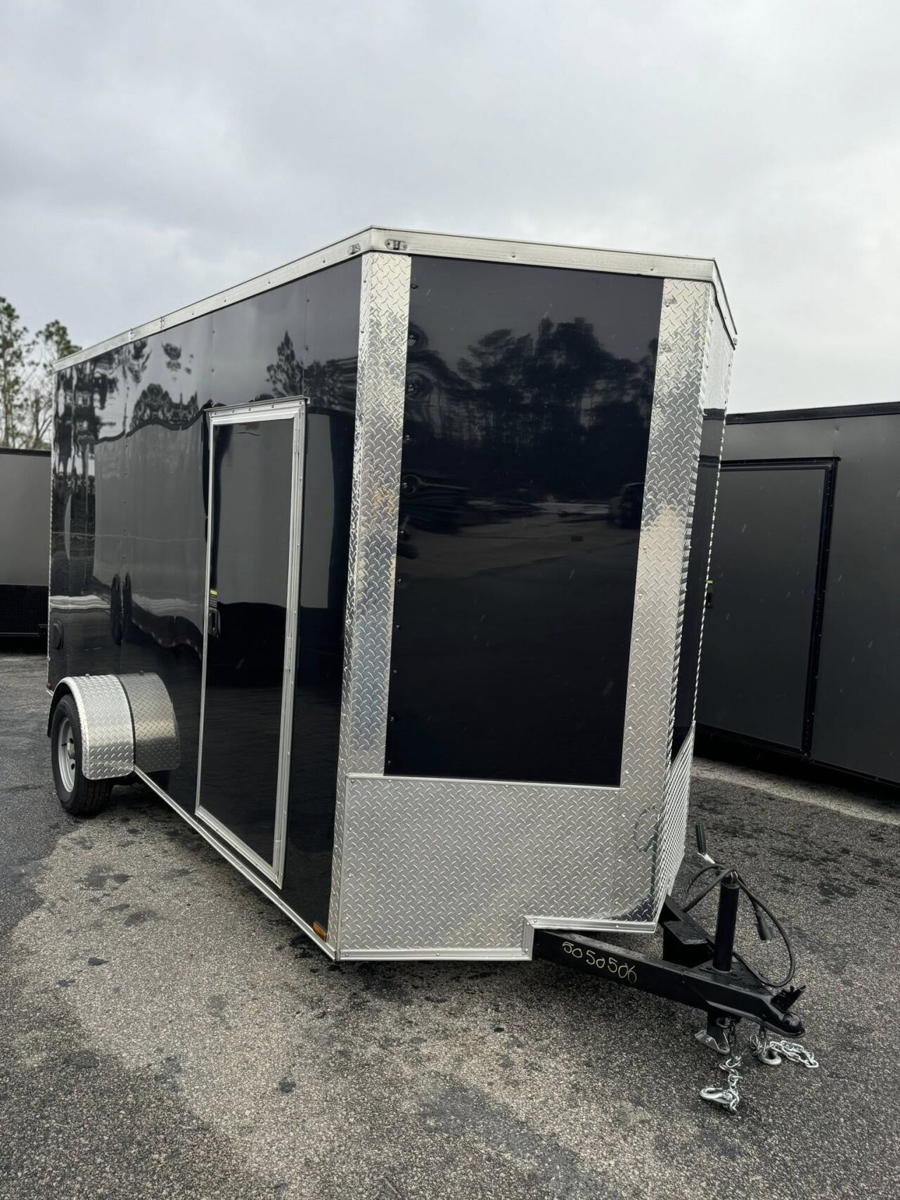 2026 Hook & Line 6x11 Enclosed Cargo trailer in black, photo 2