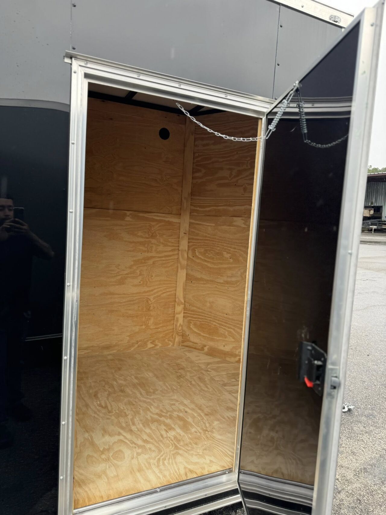 2026 Hook & Line 6x11 Enclosed Cargo trailer in black, photo 5